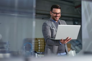 Businessman holding a laptop
